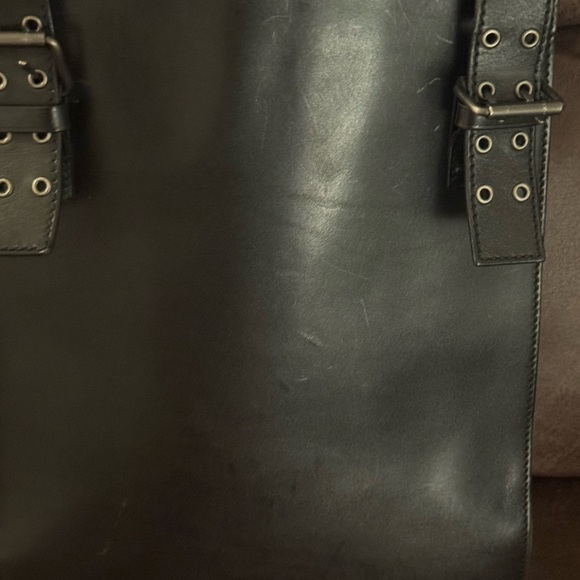 Authentic Yves Saint Laurent  Leather Grommet Detail Shoulder Handbag Black. - Picture 4 of 14